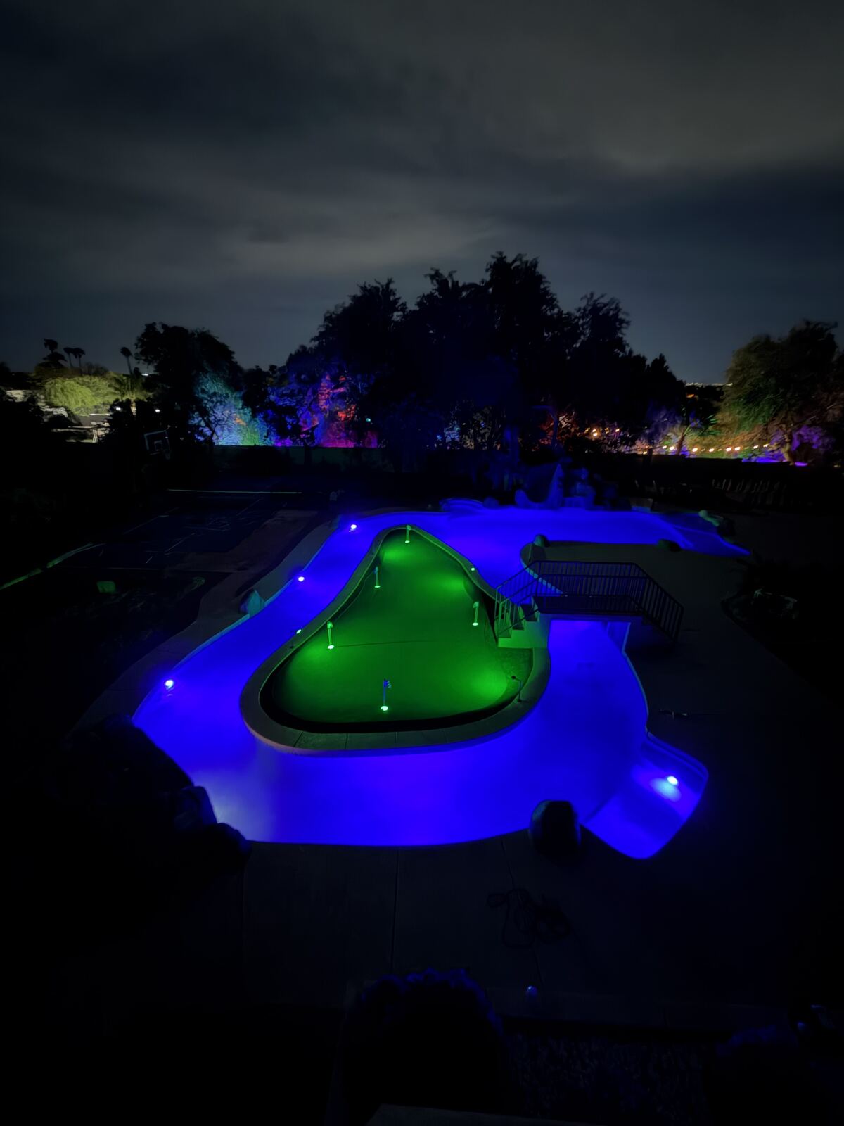 The full lazy river loop, lit up after dark